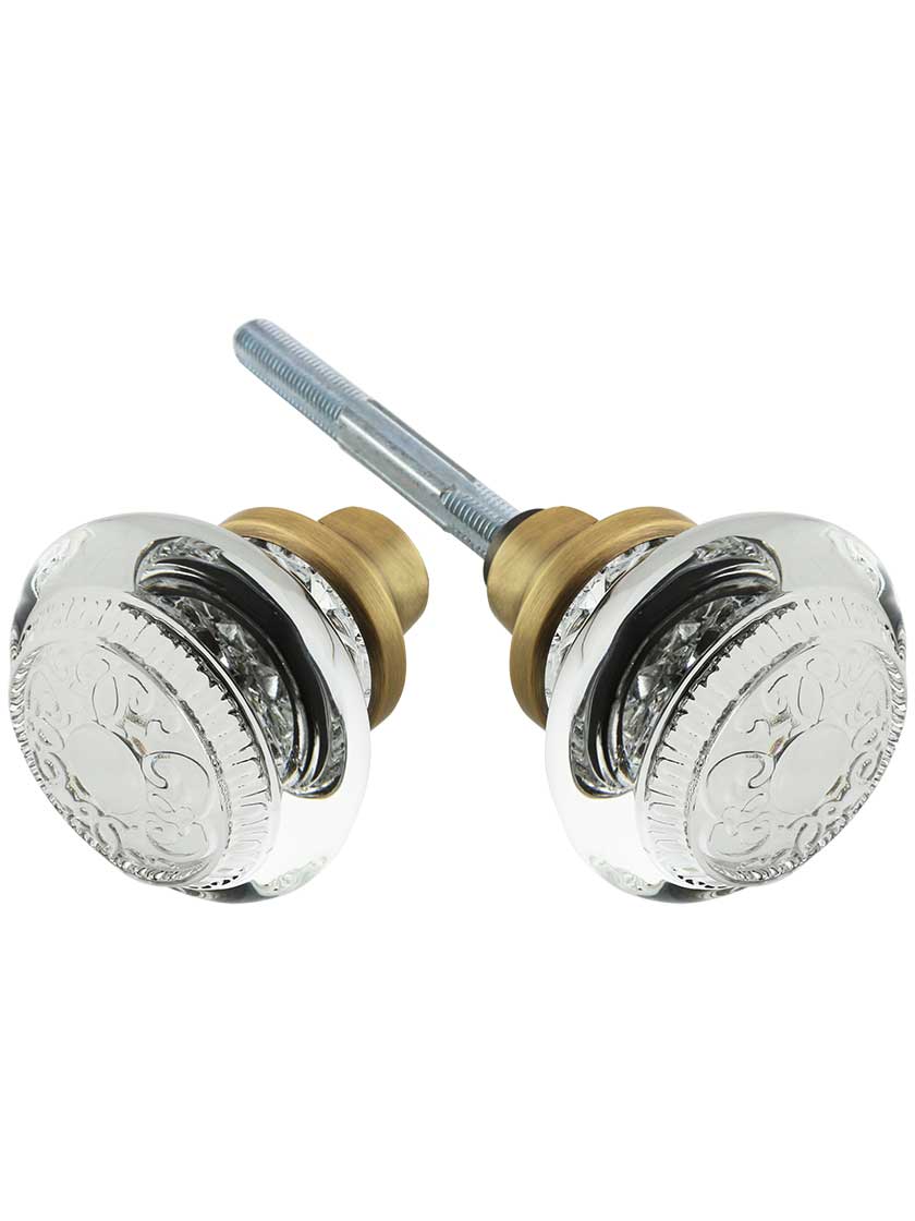 Pair of Egg and Dart Crystal-Glass Door Knobs in Antique Brass.